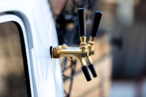 Close-up of beer bus tap Foto stock
