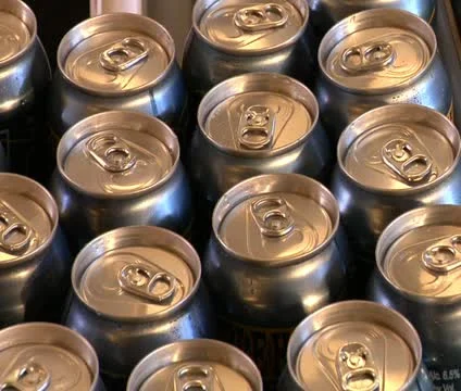Close-up of beer cans on the assembly line Stock Footage 22011859