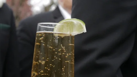 Close up of beer in glass with lime Stock Footage 103548572