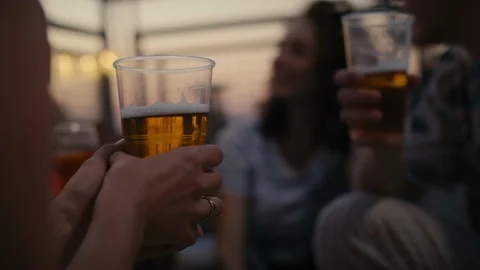 Close up of beer in hand of young man at the party Stock Footage 203949049
