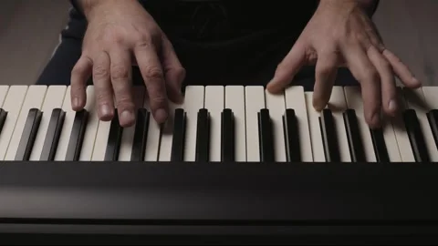 Close-Up of Beginner Pianist Playing Electronic Piano Keyboard Video stock 342237985