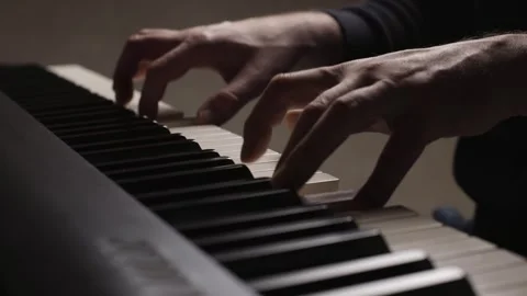 Close-up of beginner pianist practicing on a electronic piano keyboard Stock Footage 342237325
