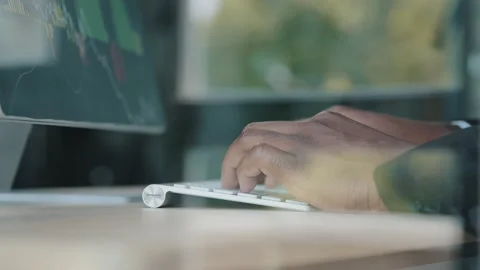 Close up behind glass view of unknown african businessman trader programmer IT Stock Footage 204752965