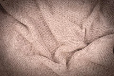 Close up beige knitted pullover background. 스톡 사진