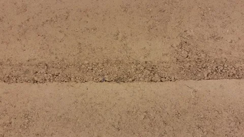 Close-Up of Beige Matte Wall with Linear Texture and Subtle Seams Stock Footage 332749484