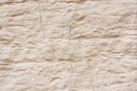 Close up beige old plaster texture background Stock Photos
