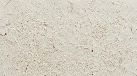 Close-up of beige stucco wall texture. Fotos Stock