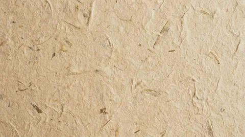 Close-up of beige textured surface. Fotos Stock