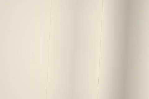 Close-up of beige wall with vertical lines and shadows Stock Photos