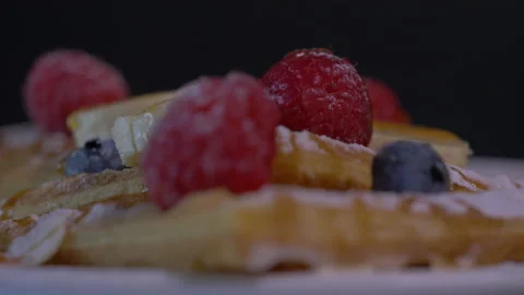 Close Up of Belgian Waffles, Maple Syrup. Banana Slices and Whipped Cream Stock-Footage 130840178