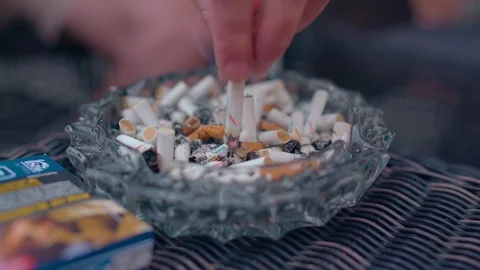 cigarette being put out Cigar being put out. Close up of a cigar... | Stock Video