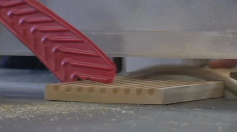 Close up of a bench saw dividing a piece of wood Stock Footage 36176151