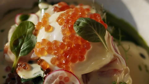 Close up benedict egg sandwich with red caviar and watercress green 스톡 동영상 151295715