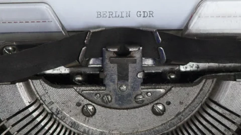 Close up BERLIN GDR being typed on vintage typewriter Stock Footage 185166560
