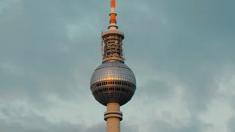 Close-up of the Berlin TV tower against the sky. Evening clouds. Video stock 106407579