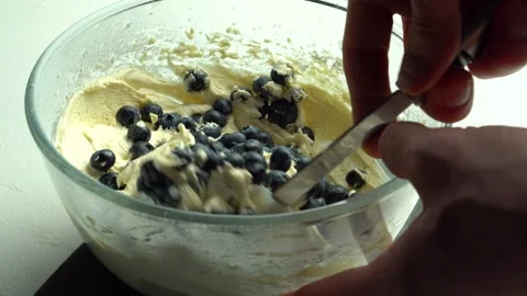 Close-up of berry muffin dough in a deep glass dish. Stock Footage 145911477