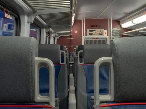 Close up of between seats in an empty train cabin Stock Photos