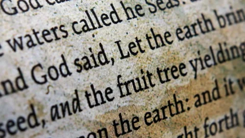 Close up of Bible Scripture Symbolizing Christian Faith and Spirituality Видео 337435118