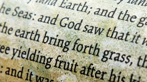 Close up of Bible Scripture Symbolizing Christian Faith and Spirituality Видео 337971568