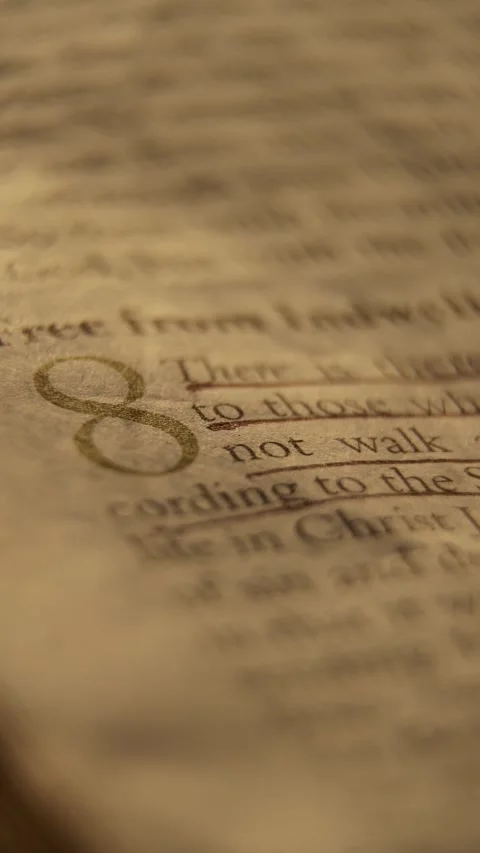 Close up of bible verse with red underline and golden chapter number Stock Footage 326363574