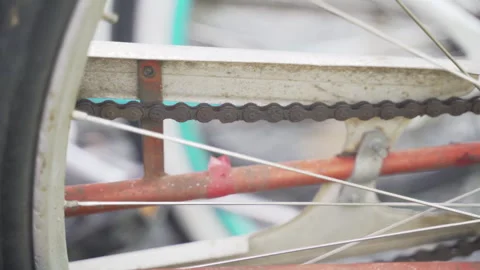 Close-up of Bicycle chain on rusty frame Stock Footage 295911317