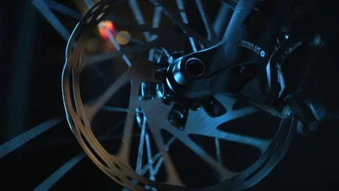 Close up on bicycle disk brake rotor. Video stock 115252464