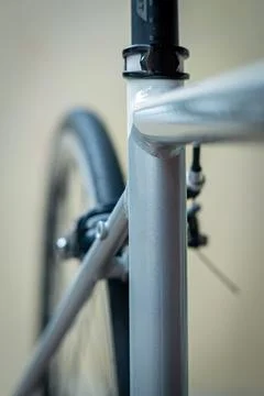 Close-up of a bicycle frame and rear wheel Stock Photos