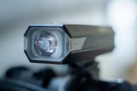 Close-up of a bicycle front light with a clear lens and LED housing Stock Photos