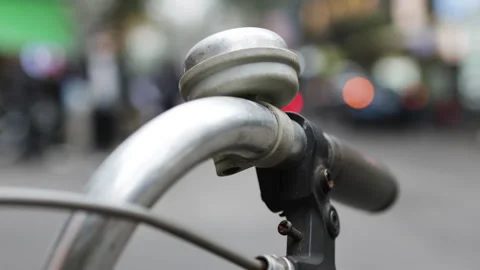 Close up of bicycle handlebar bell. Stock Footage 305533164