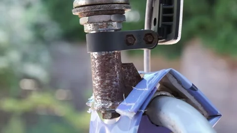 Close up of a bicycle head tube that is rusty and in need of maintenance Stock-Footage 313089059