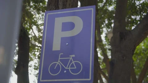 Close up of a bicycle parking sign Stock Footage 307640199