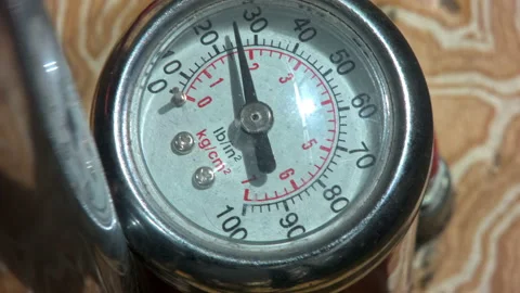 Close-Up Bicycle Pump Pressure Gauge Needle Moving During Inflation Stock Footage 155502536