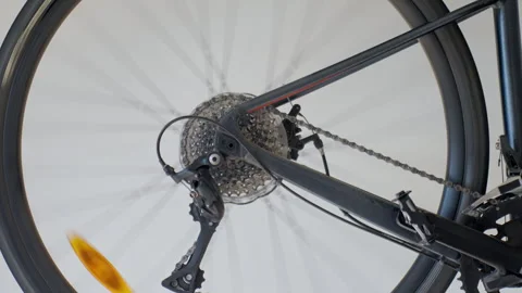Close up of bicycle rear wheel drivetrain and spinning wheel Stock Footage 330806825