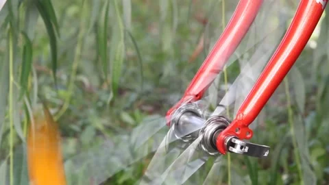 Close-up, a bicycle wheel is spinning Stock Footage 145181586