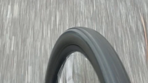 Close-Up of Bicycle Wheel Spinning in Motion on Asphalt 库存影片 336916313