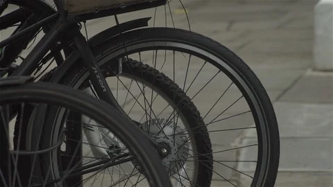 Close up Bicycle Wheels - parked Stock Footage 93207395