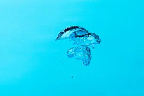 Close up of big air bubble , isolated on blue background. Foto stock