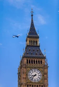 Close up of Big Ben with plane Stock Photos