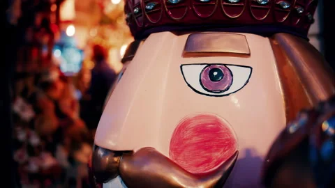 Close up of a big nutcracker figurine with blurry lights on the background Stock Footage 297538369