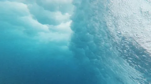 Close up of big wave passing and crashing in the sea or ocean of the beach. Para Stock Footage 151333437