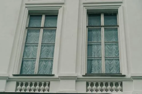 Close up of big windows of manor. Texture of windows of historic white Palace Stock Photos