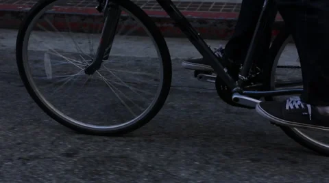 Close up - bike wheels in motion Stock Footage 45724925
