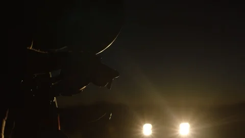 Up close of biker breathing hard at night Video stock 106474598