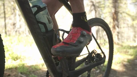 Close Up Of Biker Pedaling In Slow Motion 스톡 동영상 105886431