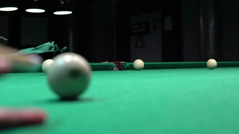 Close up of a billiard ball. Pockets the ball. Russian billiards game Stock Footage 147223197