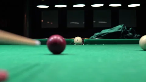 Close up of a billiard ball. Pockets the ball. Russian billiards game Stock Footage 147223381