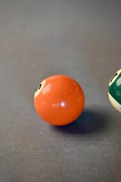 Close-up of billiard balls on a gray pool table Stock Photos