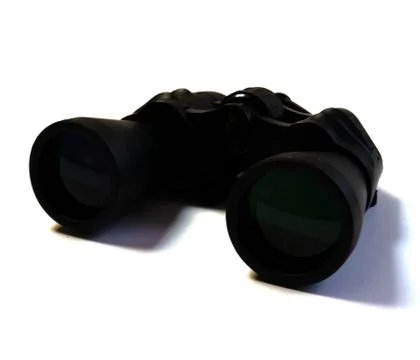 Close-up binoculars on a white background. Stock Photos