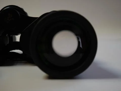 Close-up binoculars on a white background. Stock Photos