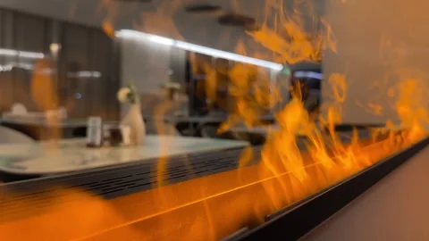 Close-up on bio fireplace burning inside restoran. Detail in interior Stock Footage 286845008